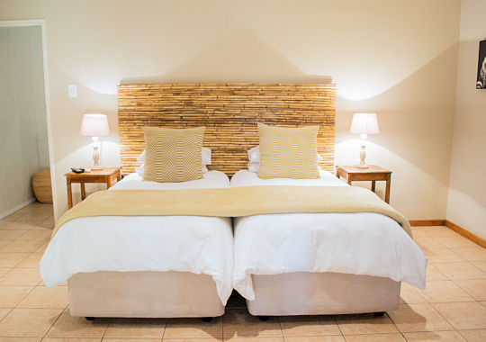 Slaapkamer bij The Safari Club in Johannesburg