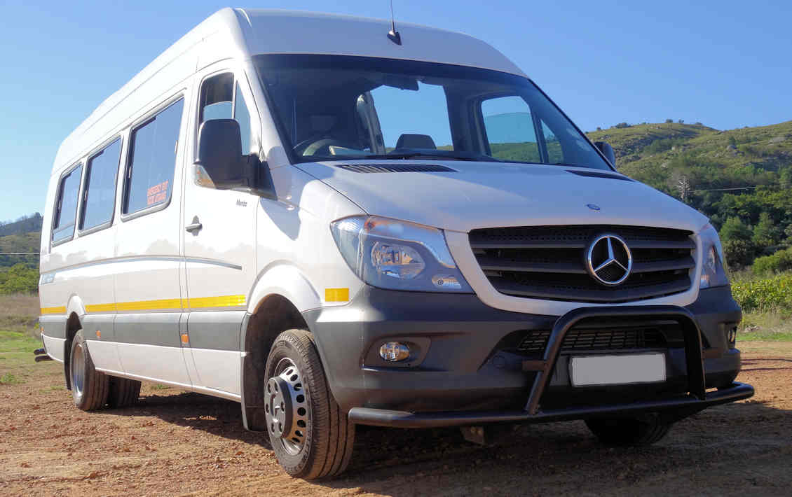 Vervoer per minibus tijdens groepsreis Zuid Afrika